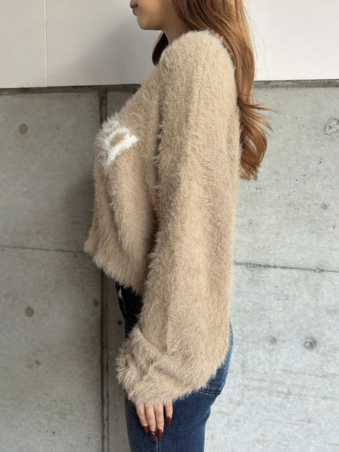 ロゴシャギーニットトップス